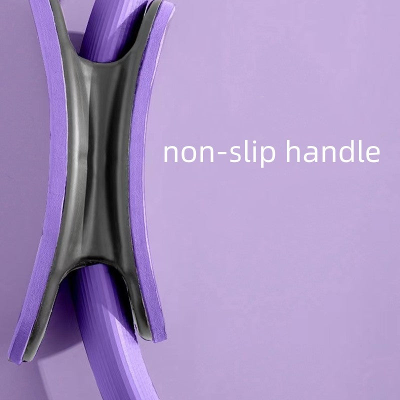 Close-up of a purple cleaning tool with a non-slip handle on a purple background.