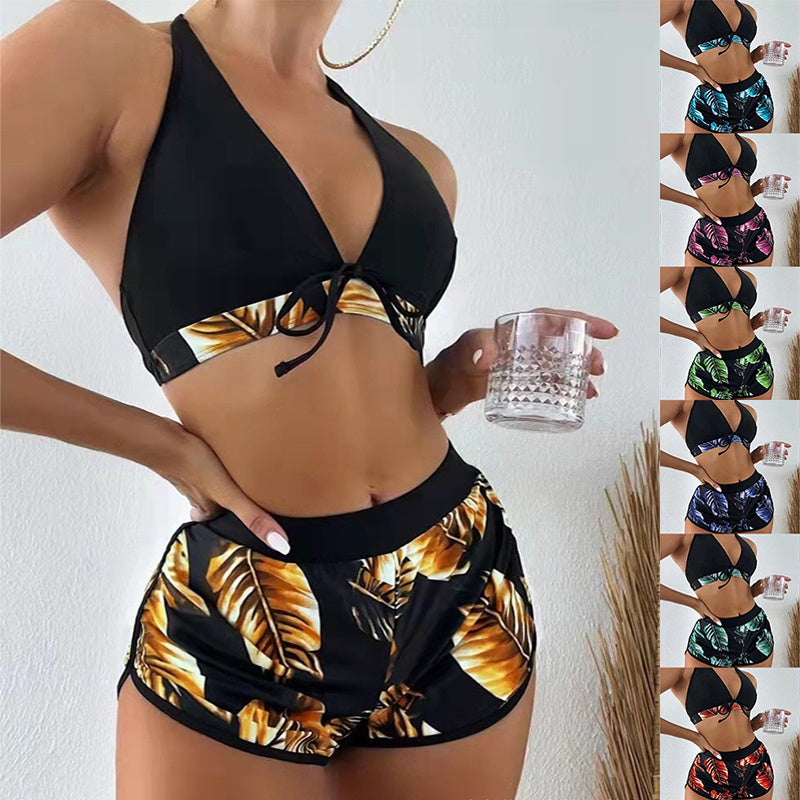 A collection of leaf print bikinis with shorts, available in multiple colors, displayed on a model holding a drink.