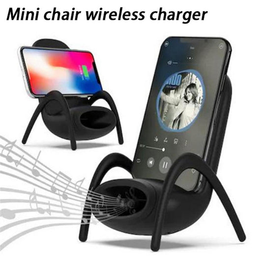 A black portable mini chair wireless charger with a mobile phone placed on it, indicating the function of charging.