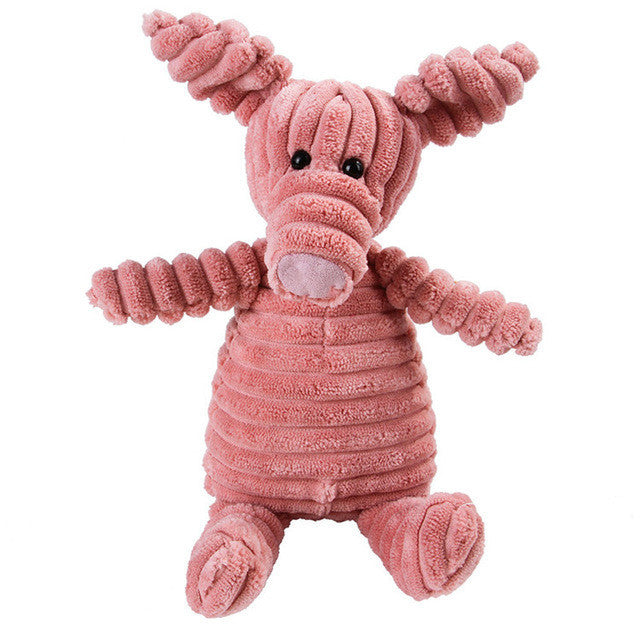 Pink plush toy with a textured surface on a white background