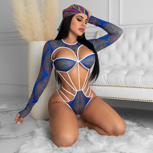 A woman wearing a multicolored geometric patterned one-piece swimsuit with long sleeves and a drawstring design.