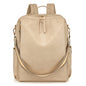 Beige backpack with a shoulder strap on a white background