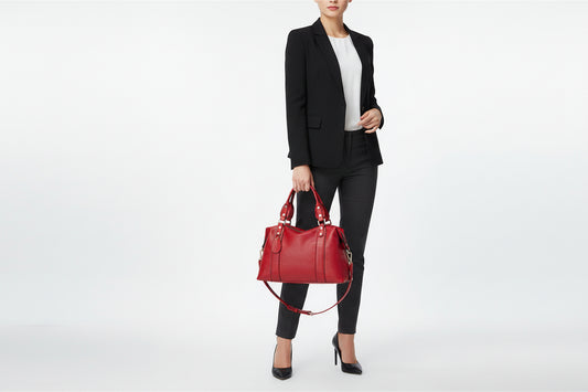A wine red PU leather handbag with a lychee pattern, featuring a shoulder strap, two handles, and gold-tone hardware.