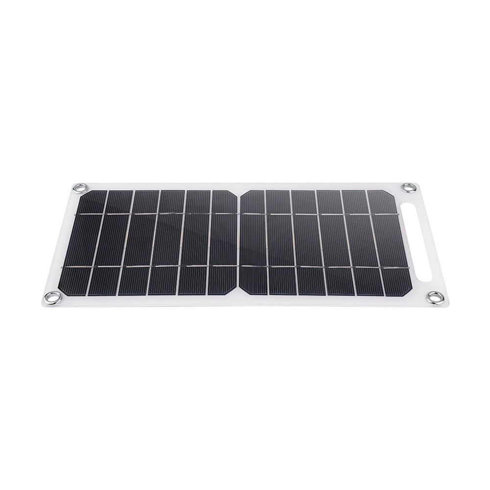 Solar panel with black surface and silver frame on white background