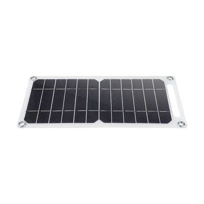 Solar panel with black surface and silver frame on white background
